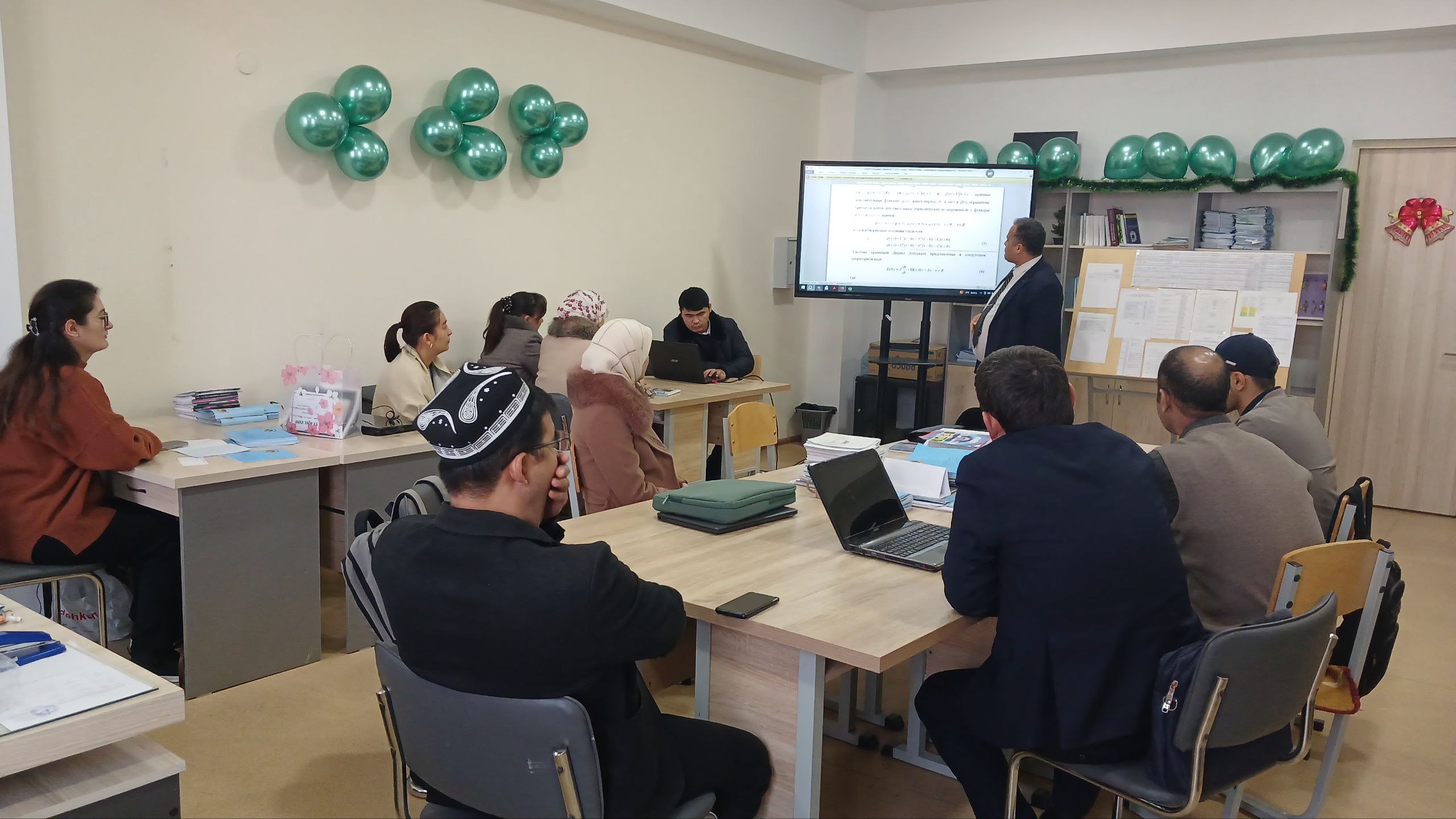 INTEGRATION OF A NONLINEAR SCHRÖDINGER EQUATION OF NEGATIVE ORDER WITH A SELF-CONSISTENT SUM SOURCE